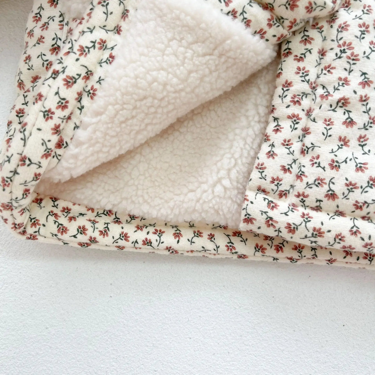 Baby winter jacket with floral print and sherpa collar overlay detail