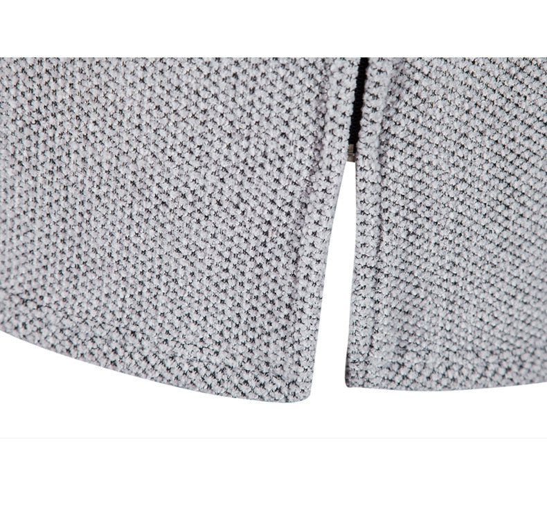 Light gray hooded cardigan coat hem detail with center front zipper seam
