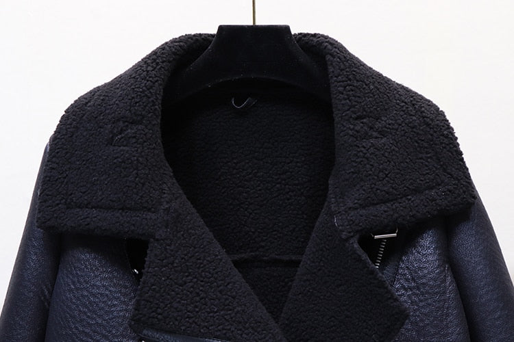 Black moto jacket collar with fuzzy lining and open neckline detail