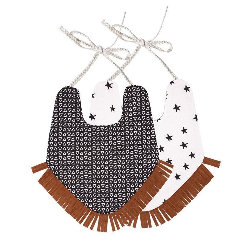 Infant bandana bib set with black geometric and star pattern, brown fringe hem