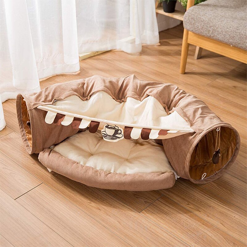 Brown cat tunnel tube with cream striped canopy, plush round bed, and side entrance