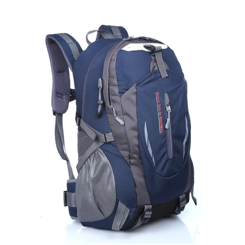 Water-resistant hiking backpack in navy blue and gray with front zipper pocket and shoulder straps