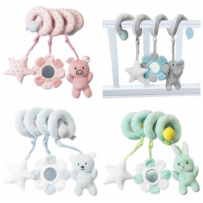 Baby crib spiral rattles toy with pig plush, stars, and dangling flowers in pink