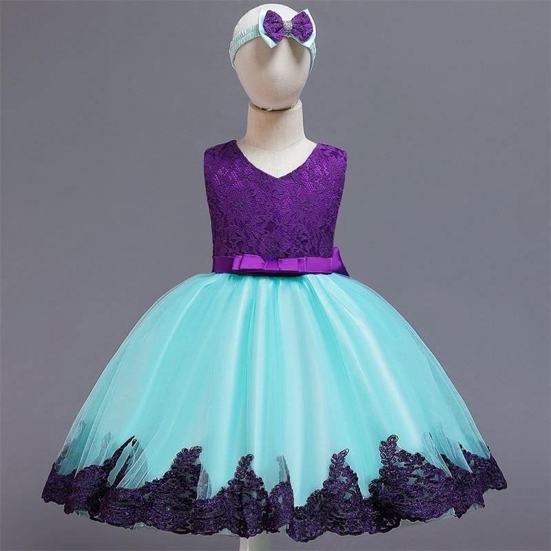 Teal tulle dress with purple lace bodice, waist bow, and matching head bow