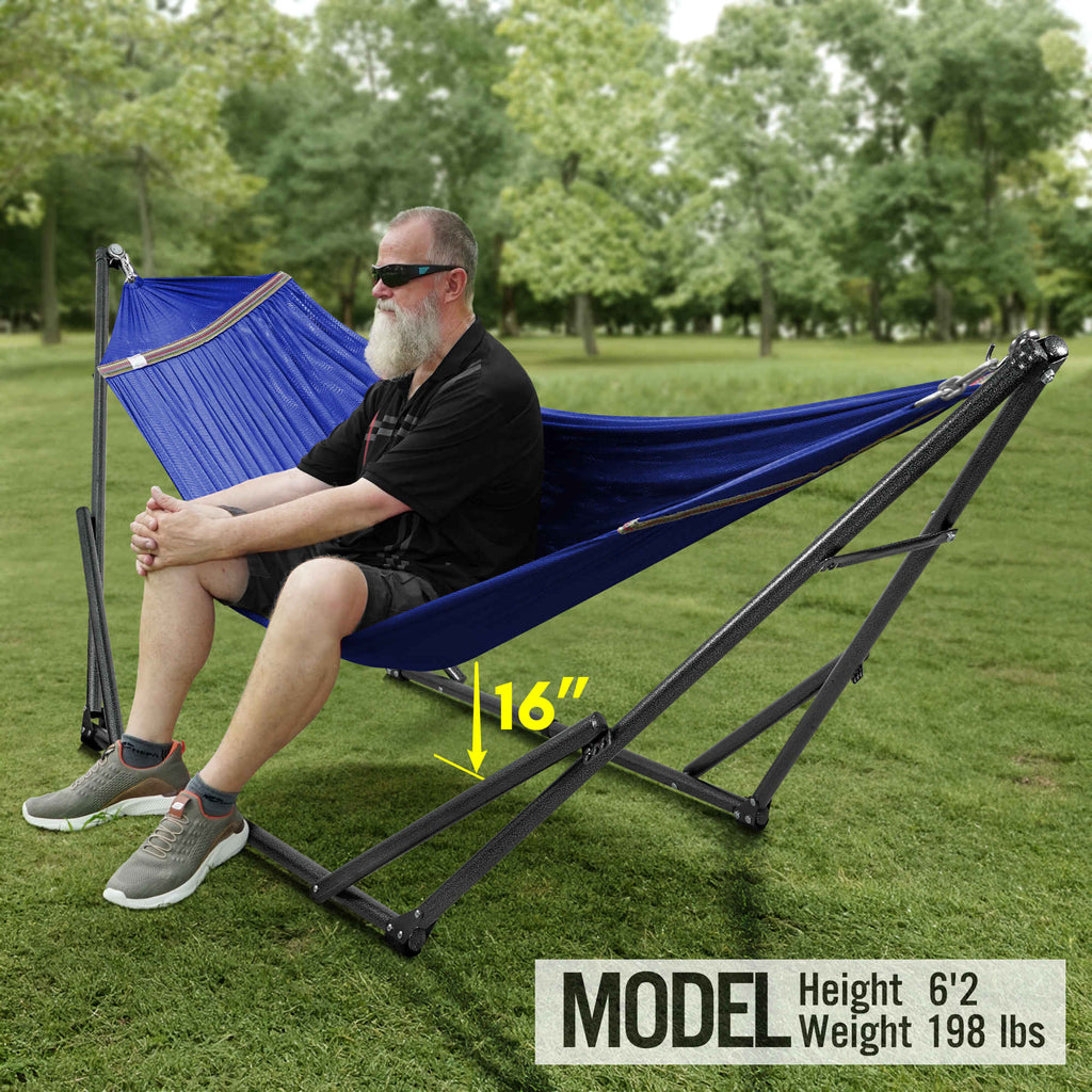 Blue hammock with medium stand, fabric hammock stretched on black folding frame