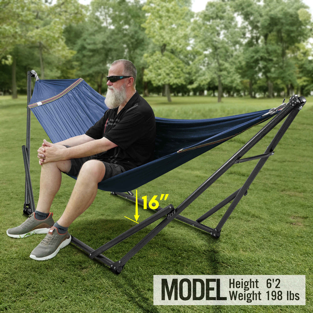 Blue hammock on black folding stand outdoors, person relaxing