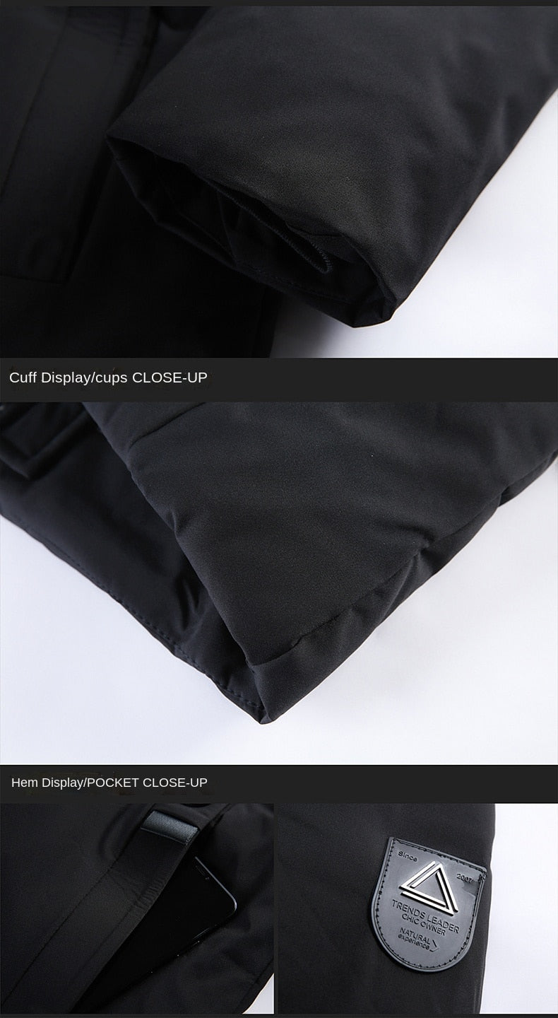 Men's black parka cuff and hem close-up with pocket flap and stitched detailing