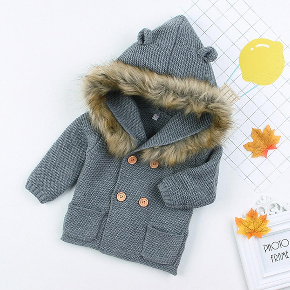 Gray knit baby hooded coat with brown fur trim and four-button front
