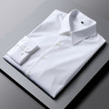 White cotton dress shirt with spread collar and button cuffs