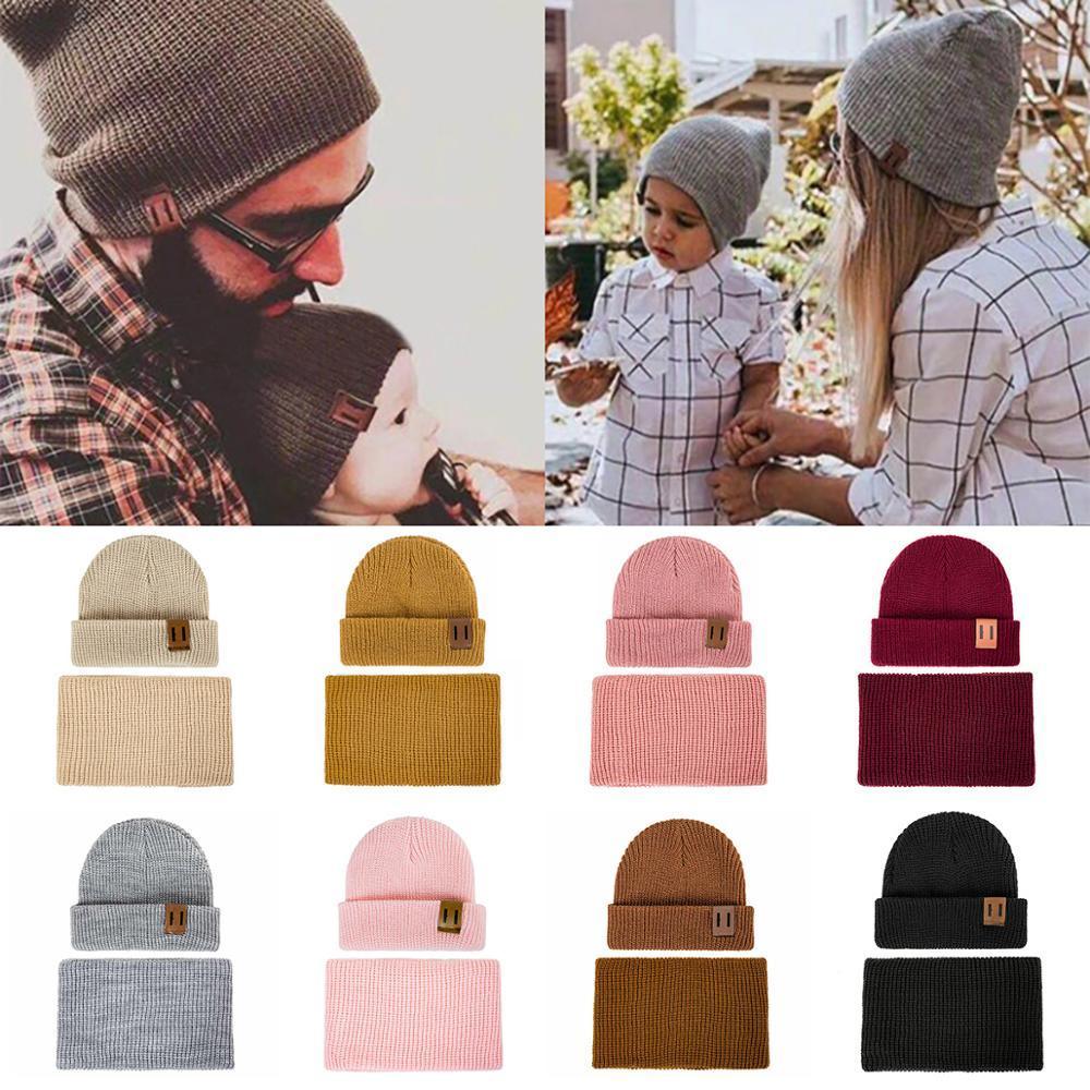 Knit baby hat and neck warmer set on children, featuring matching beanie and snood
