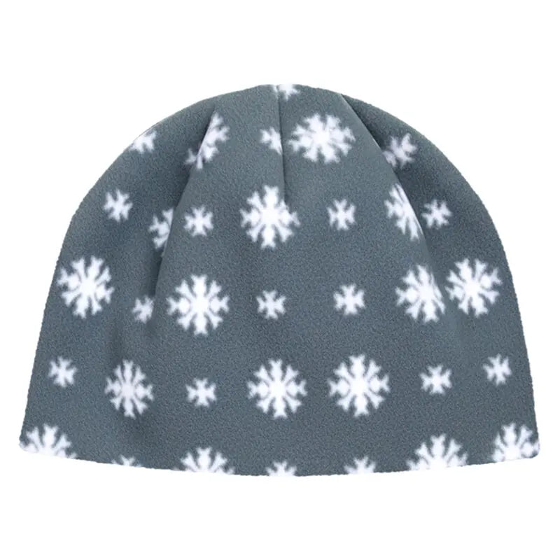 Unisex fleece toque hat in dark gray with repeating white snowflakes pattern
