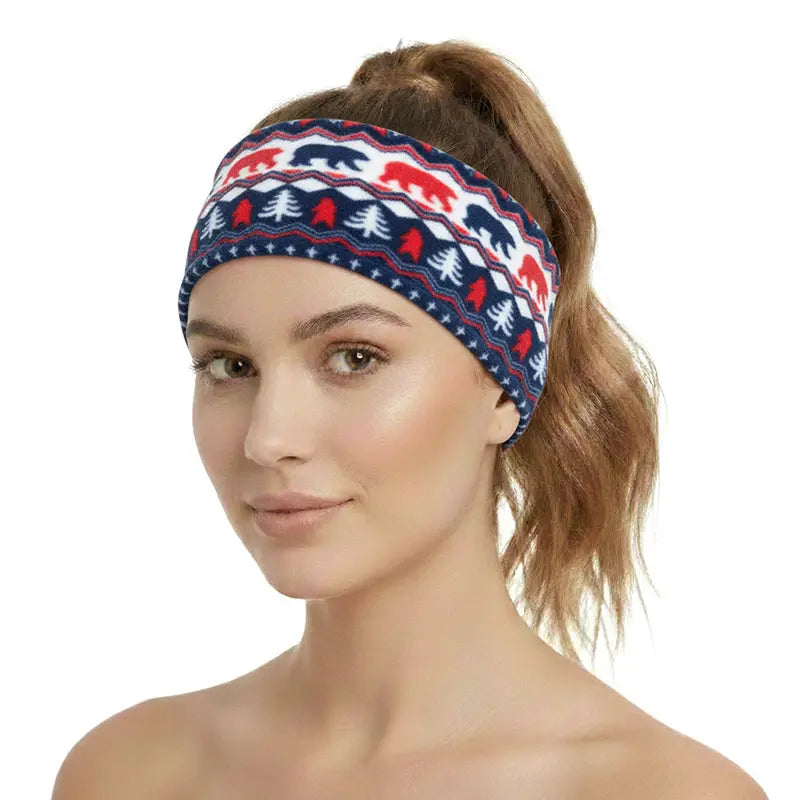 Fleece headband in navy with red and white Nordic reindeer and snowflake pattern