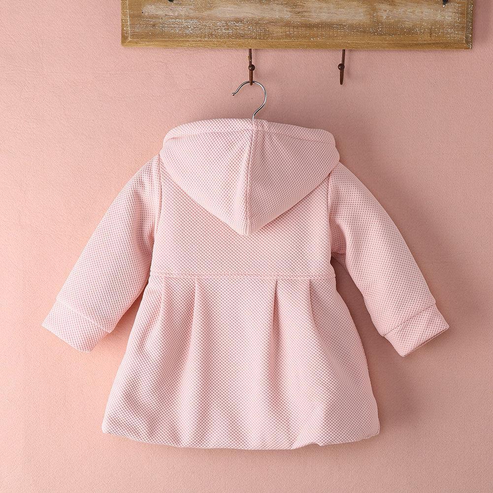 Light pink hooded toddler coat on hanger with long sleeves and back view