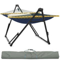 Hammock with stand, navy fabric with striped ropes, light wood spreader, black legs
