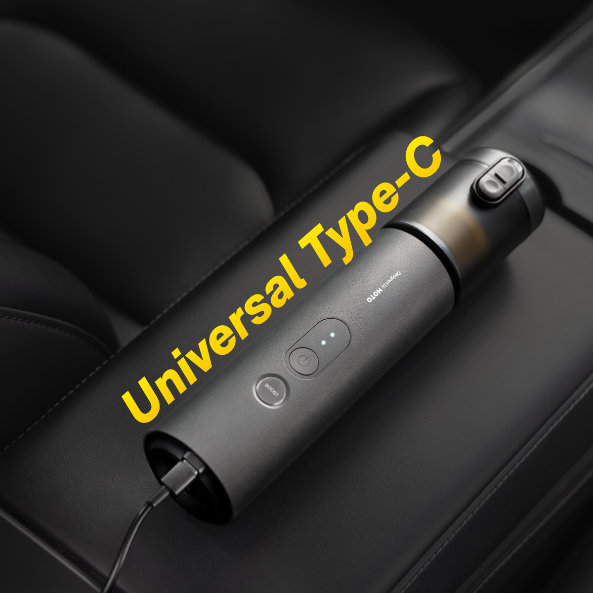 Handheld car vacuum duster with Type C charging port on dark gray body