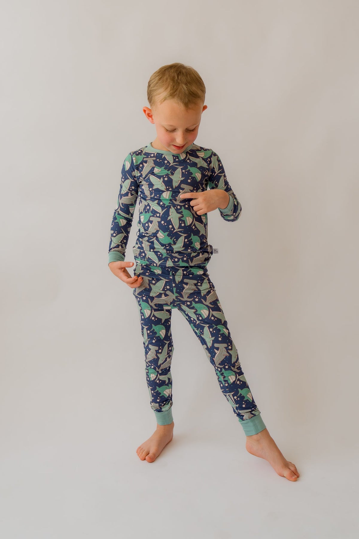 Blue shark-printed pajama set with long-sleeve top and cuffed ankle pants