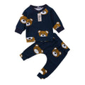 Navy toddler pajama set with long-sleeve top and bear face prints, matching pants