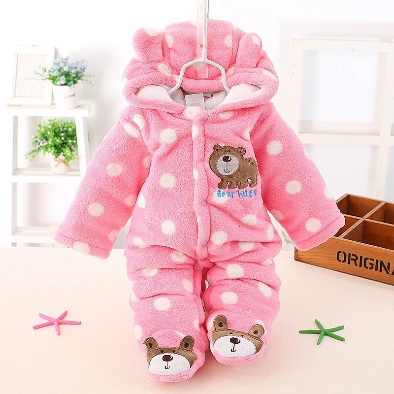 Pink hooded plush bear romper with white polka dots and bear pocket patch