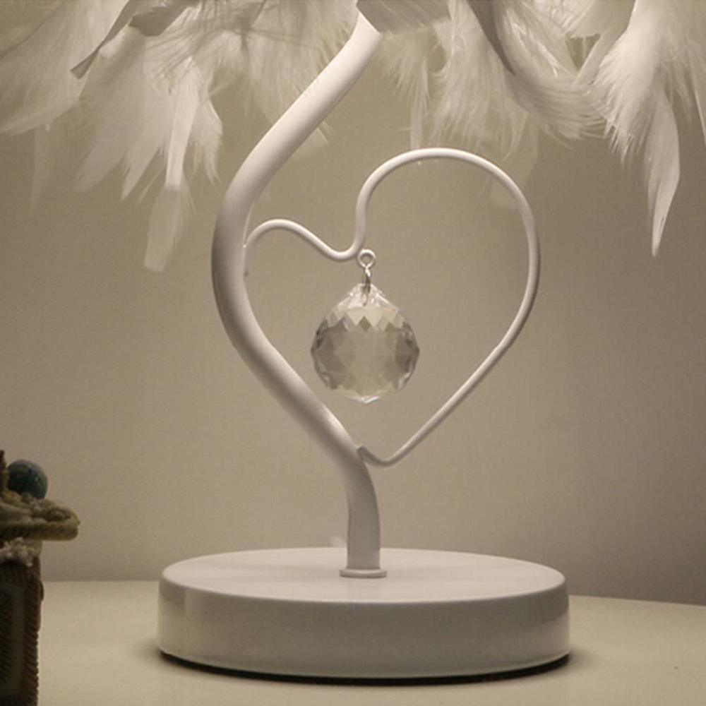 Heart-shaped metal stand table lamp with clear crystal heart charm and white base