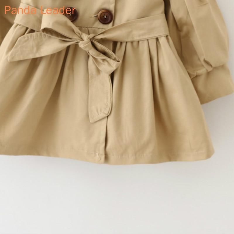 Khaki baby windbreaker coat front with tied belt and double button placket