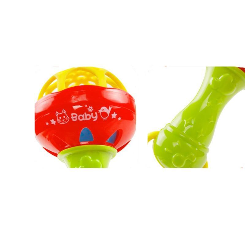 Baby plastic hand rattle with red bowl and lime-green legs