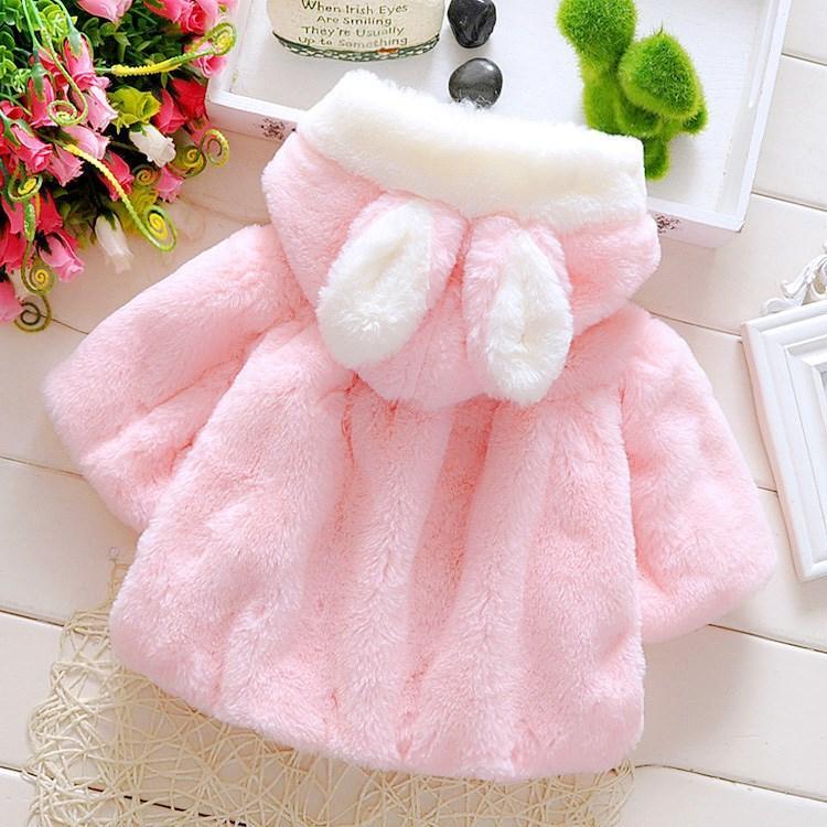 Baby girls winter coat, light pink plush with rabbit-ear hood, pom-poms, and bow