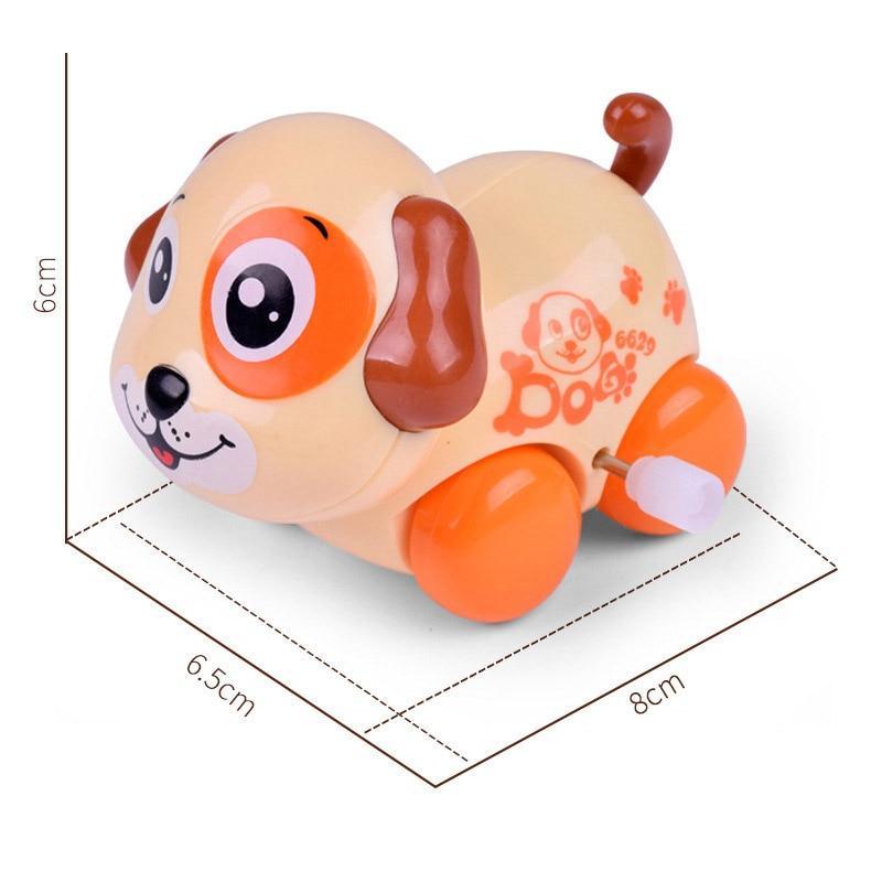 Beige and orange cartoon puppy wind-up car rattle with big eyes and floppy ears