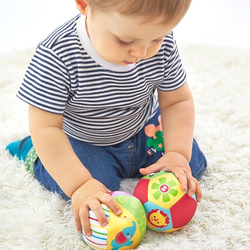 Soft plush animal ball rattle toy with multicolor panels and baby activity graphics