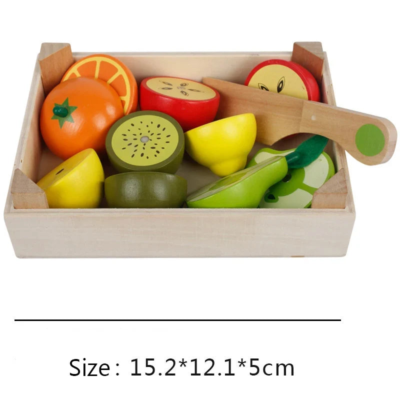 Wooden toy fruit and vegetable set with orange, kiwi, lemon, and green pieces in crate