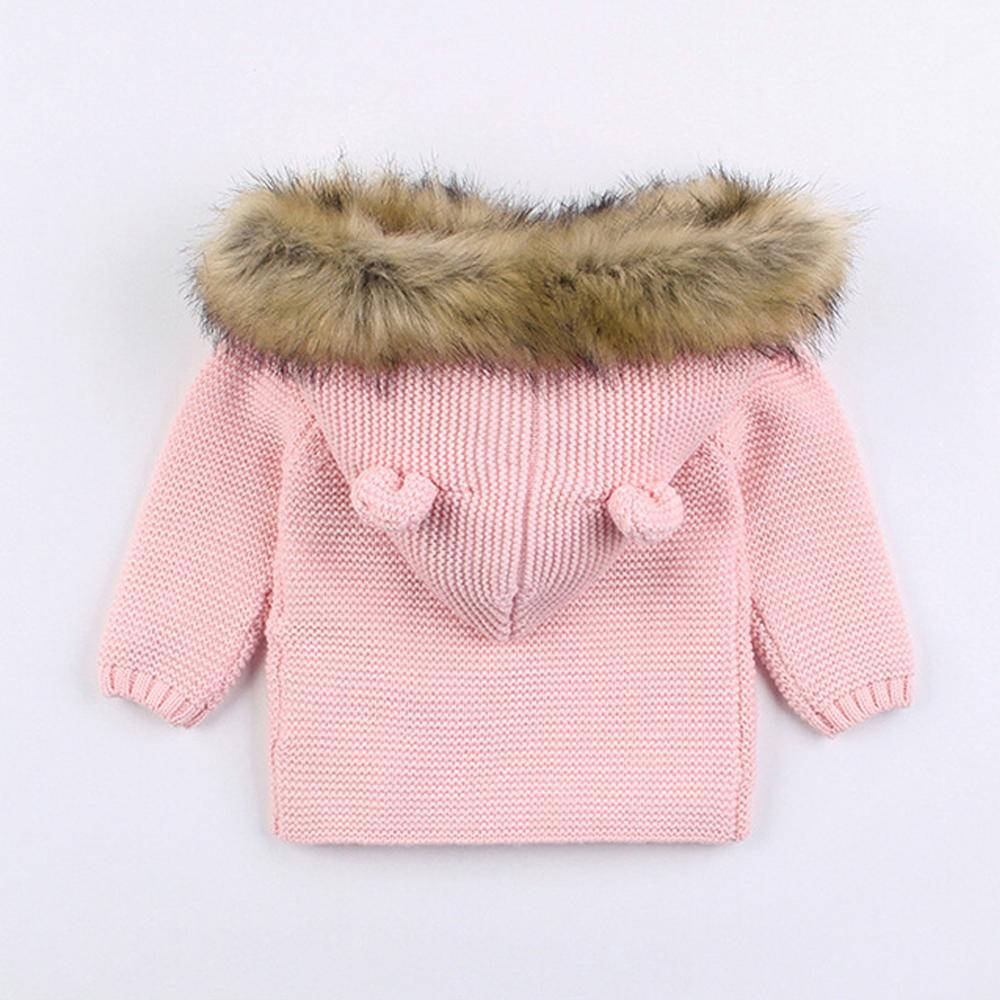 Pink newborn knit hooded coat with faux fur-trim hood