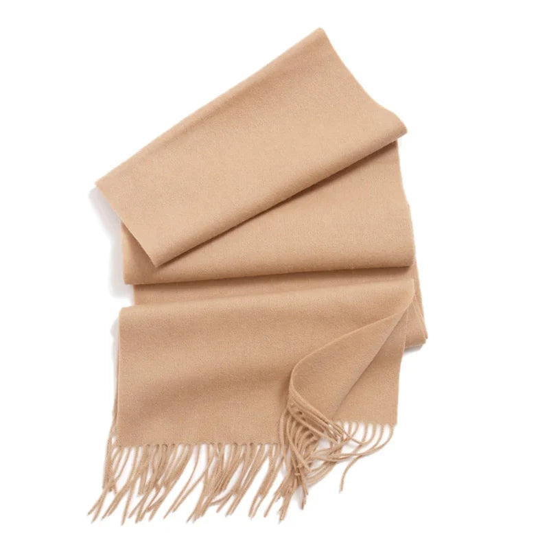100% wool winter scarf in light beige, folded with long fringed tassels