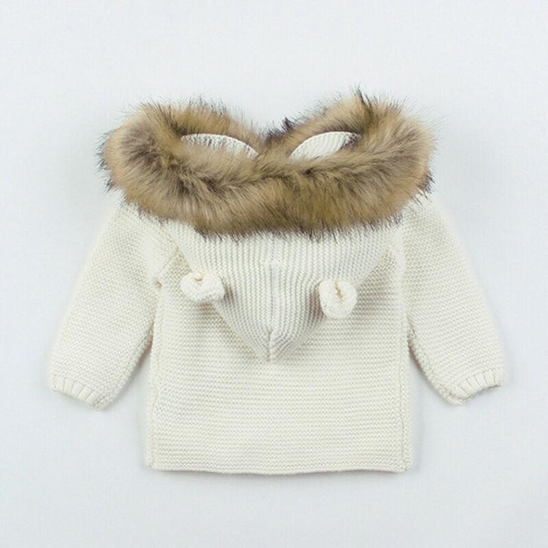 Cream newborn knit hooded coat with fuzzy fur-trim hood