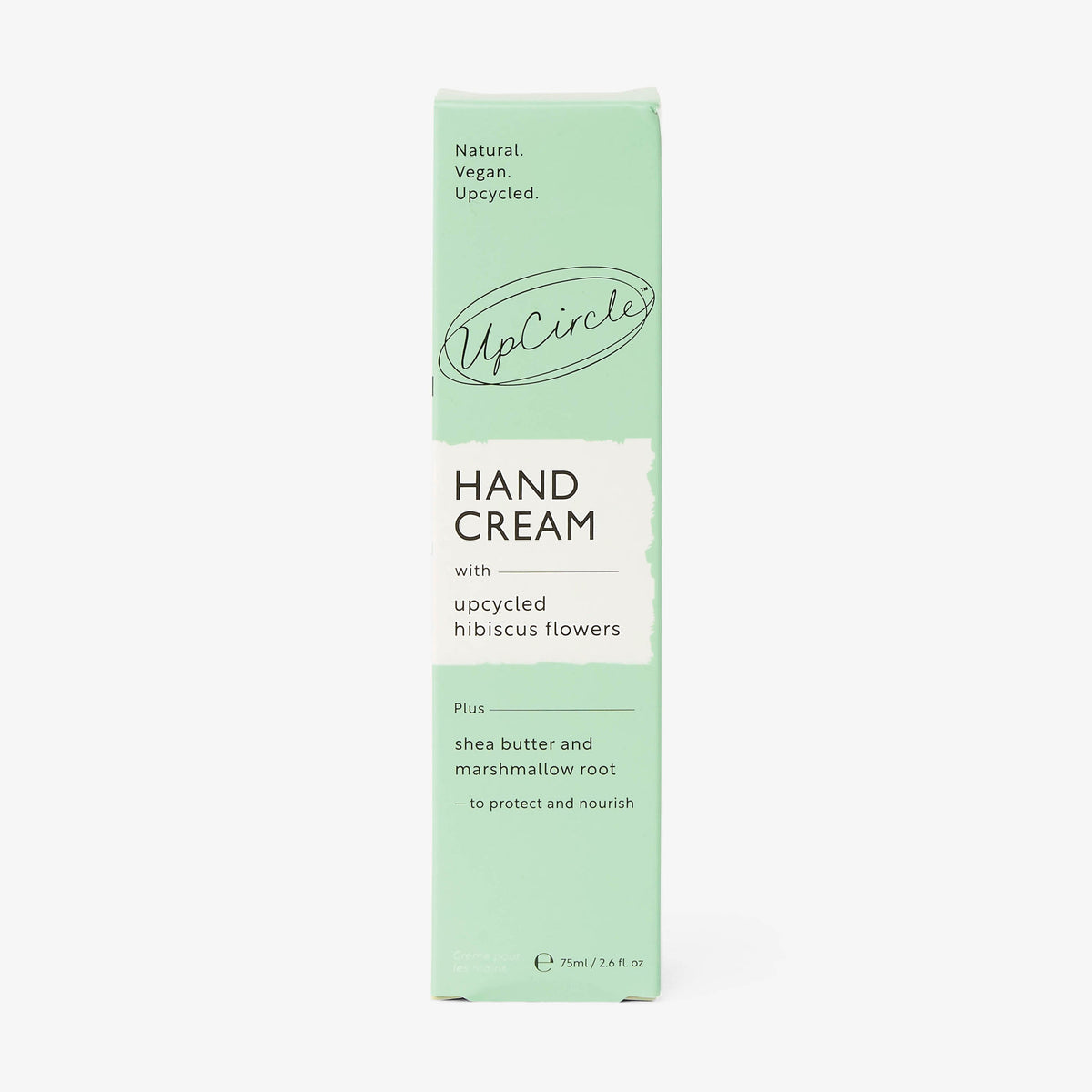UpCircle green hand cream tube with side panel and ingredient highlights