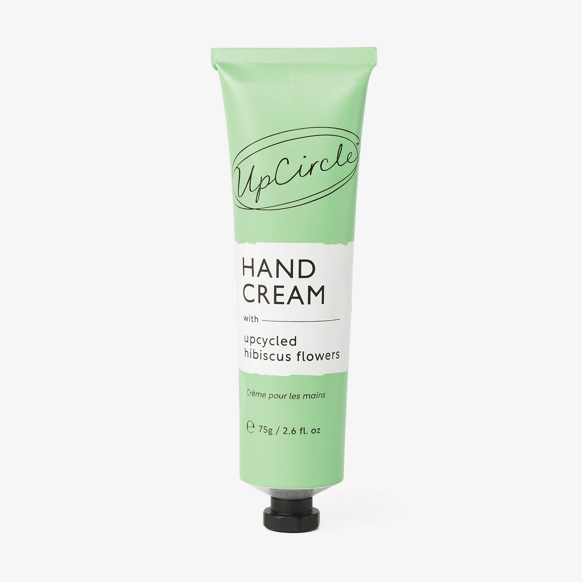 UpCircle green hand cream tube with hibiscus flower label