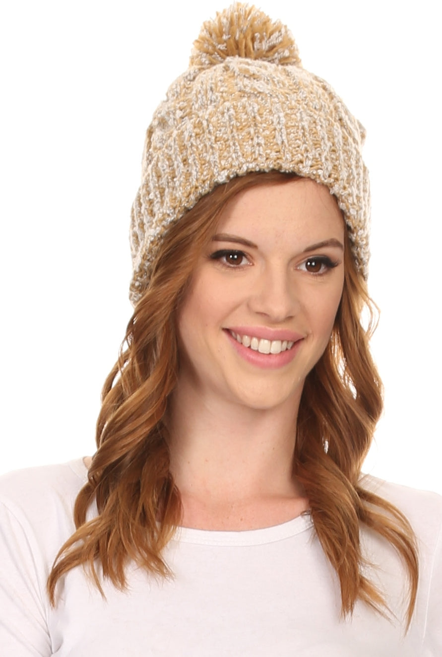 Beige heather knit beanie with textured pattern and matching pom-pom top