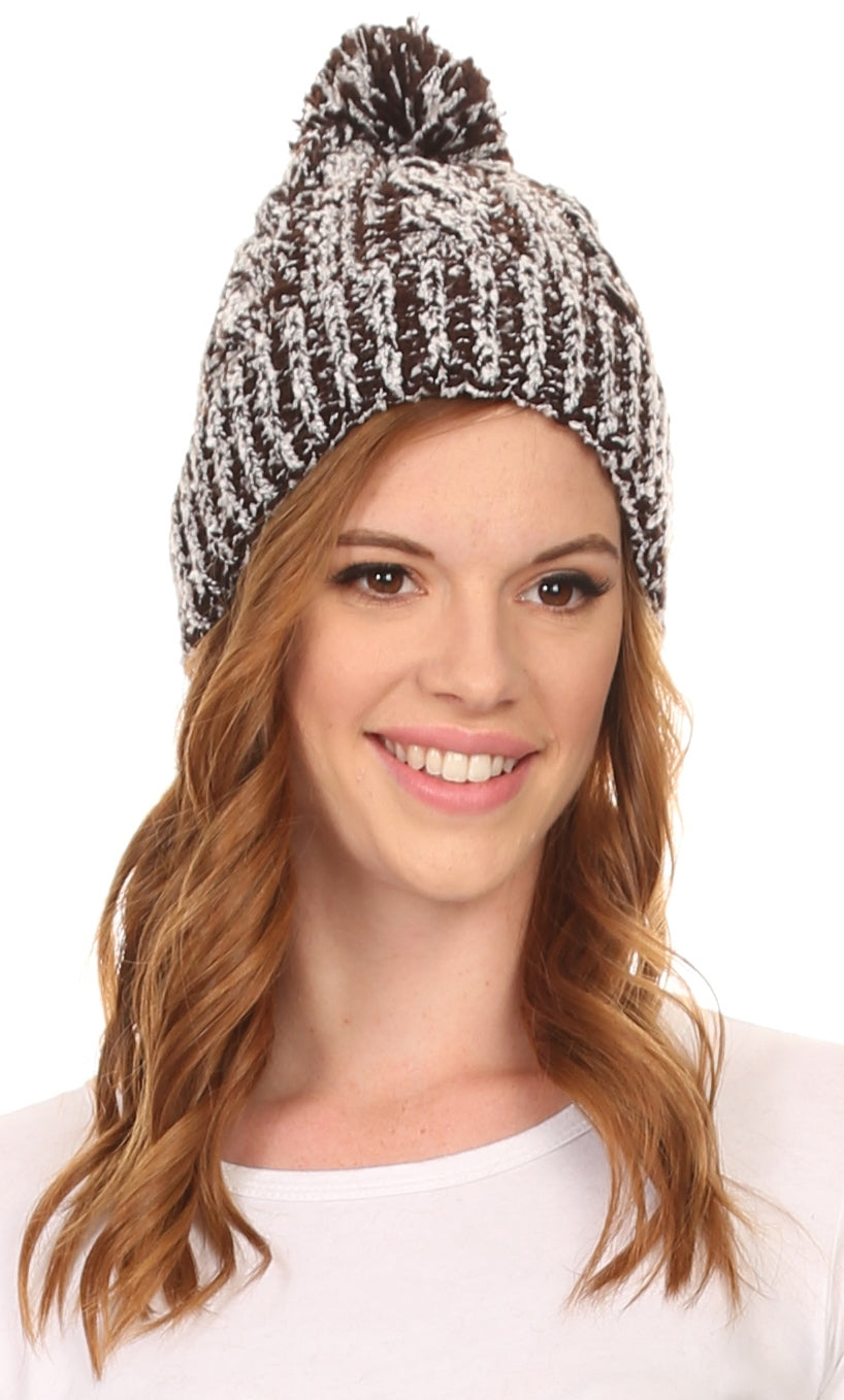 Speckled black-and-white textured knit pom pom beanie hat with ribbed cuff, front view