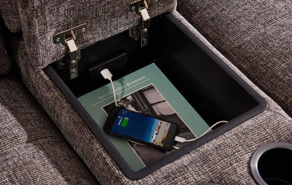 Sleeper sectional storage compartment under seat panel with hinged lift cover