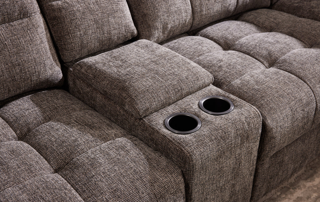 Gray sleeper sectional seat with two cupholders in armrest/storage area