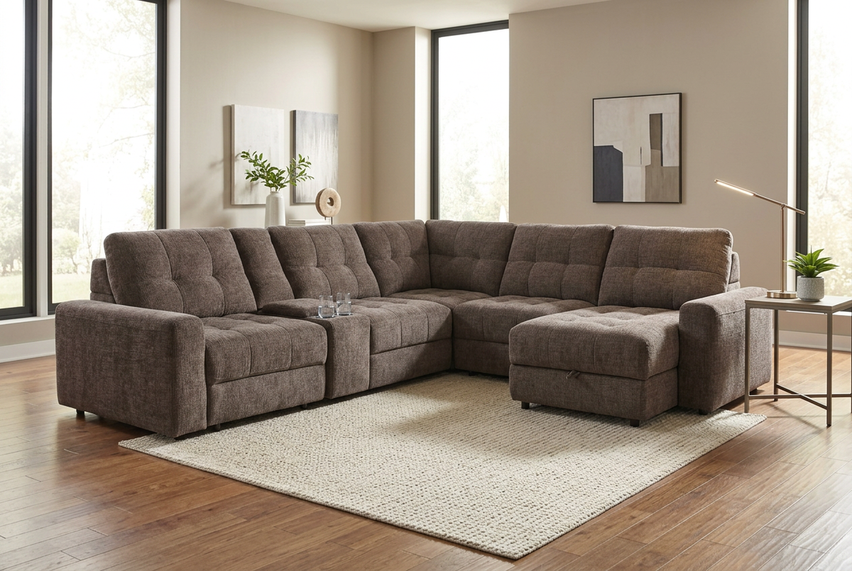 Gunmetal gray L-shaped sectional sofa with tufted back cushions and storage ottoman.