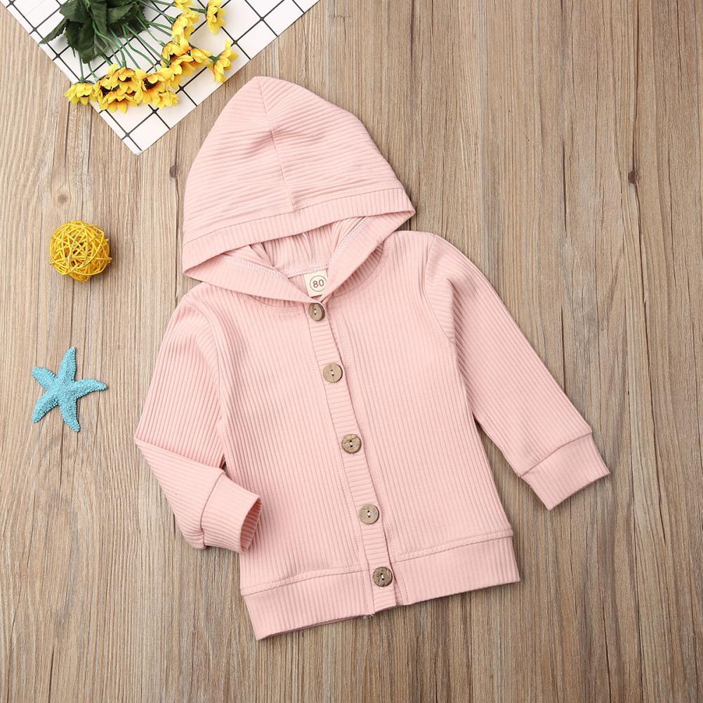 Infant pink hooded knit jacket shown from the side, with button front and long sleeves