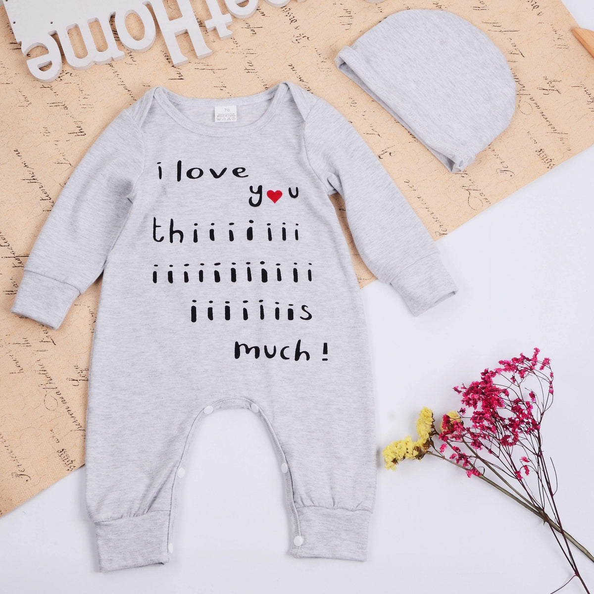 Newborn cotton romper, light gray long sleeves with “I love thiiiiiiiis much!” text
