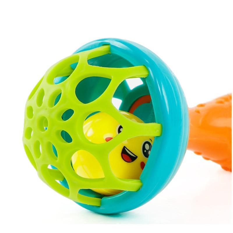 Baby plastic ball rattle with blue shell, green cage, and yellow face
