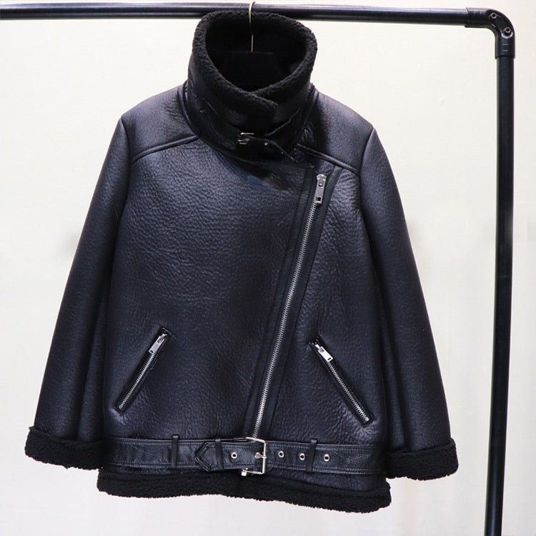 Black moto faux leather jacket with stand collar, center zipper, and two zip pockets