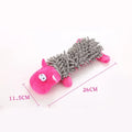 Pink and gray spiky plush hippo-shaped dog chew toy with textured snout detail