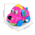 Pink cartoon dog wind-up car rattle with blue wheels and paw print side