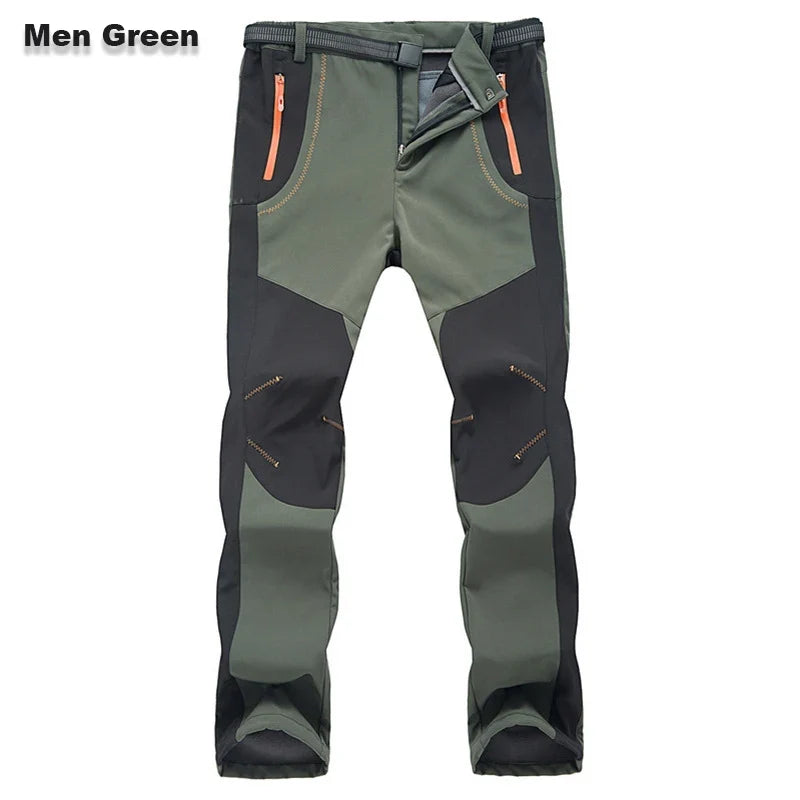 Men's green hiking pants with zip pockets and adjustable cuffs, fleece-lined soft shell look