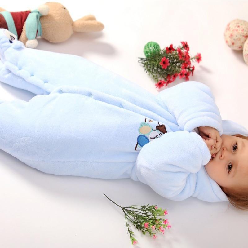 Light blue hooded plush bear romper with cartoon patch on front