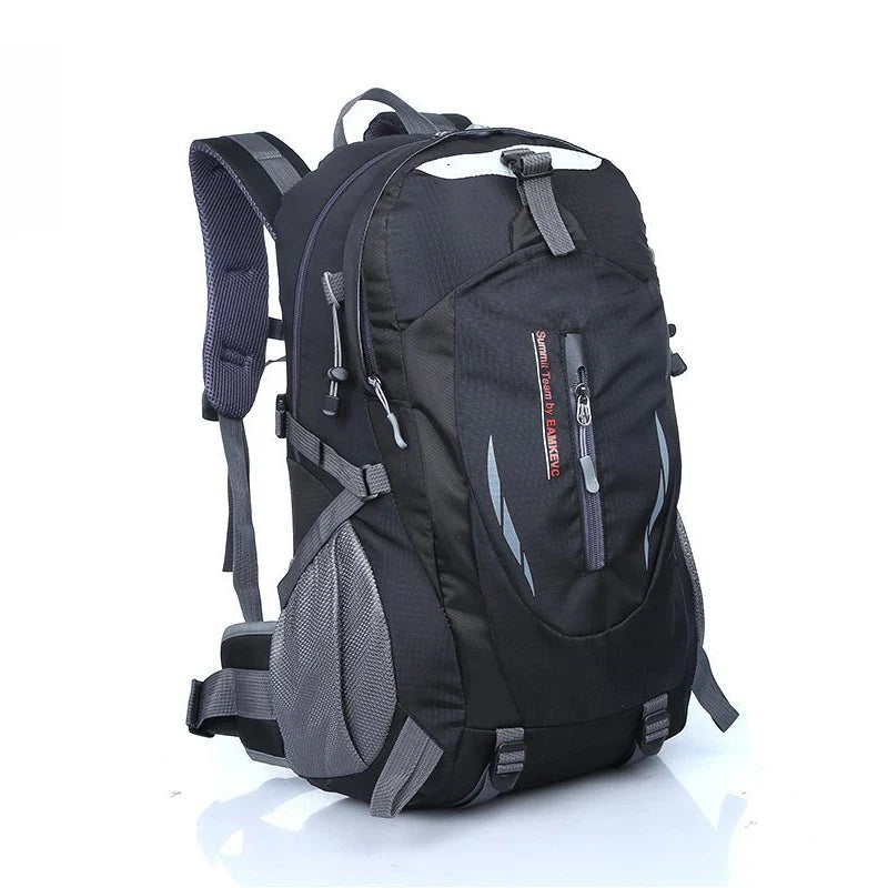 Water-resistant hiking backpack in dark navy and gray with front zip pocket and padded straps
