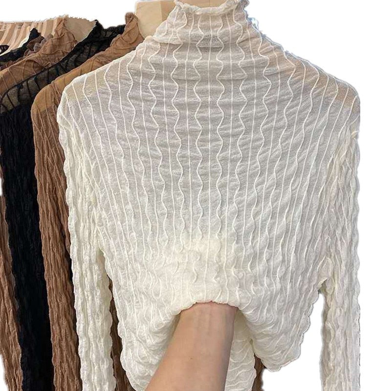 Ivory lace mesh high-collar long-sleeve fitted top with ruffled neckline