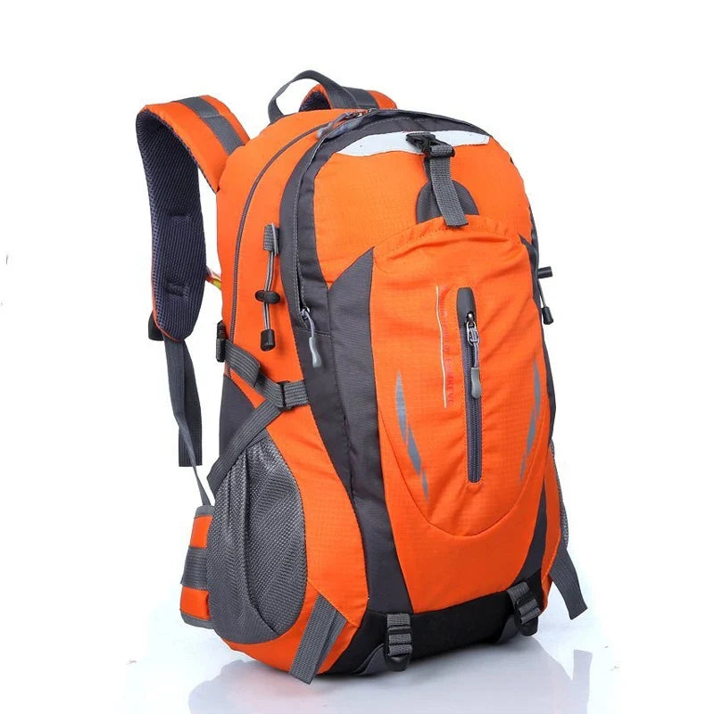Water-resistant hiking backpack in bright orange and dark gray with front zip pocket and side straps